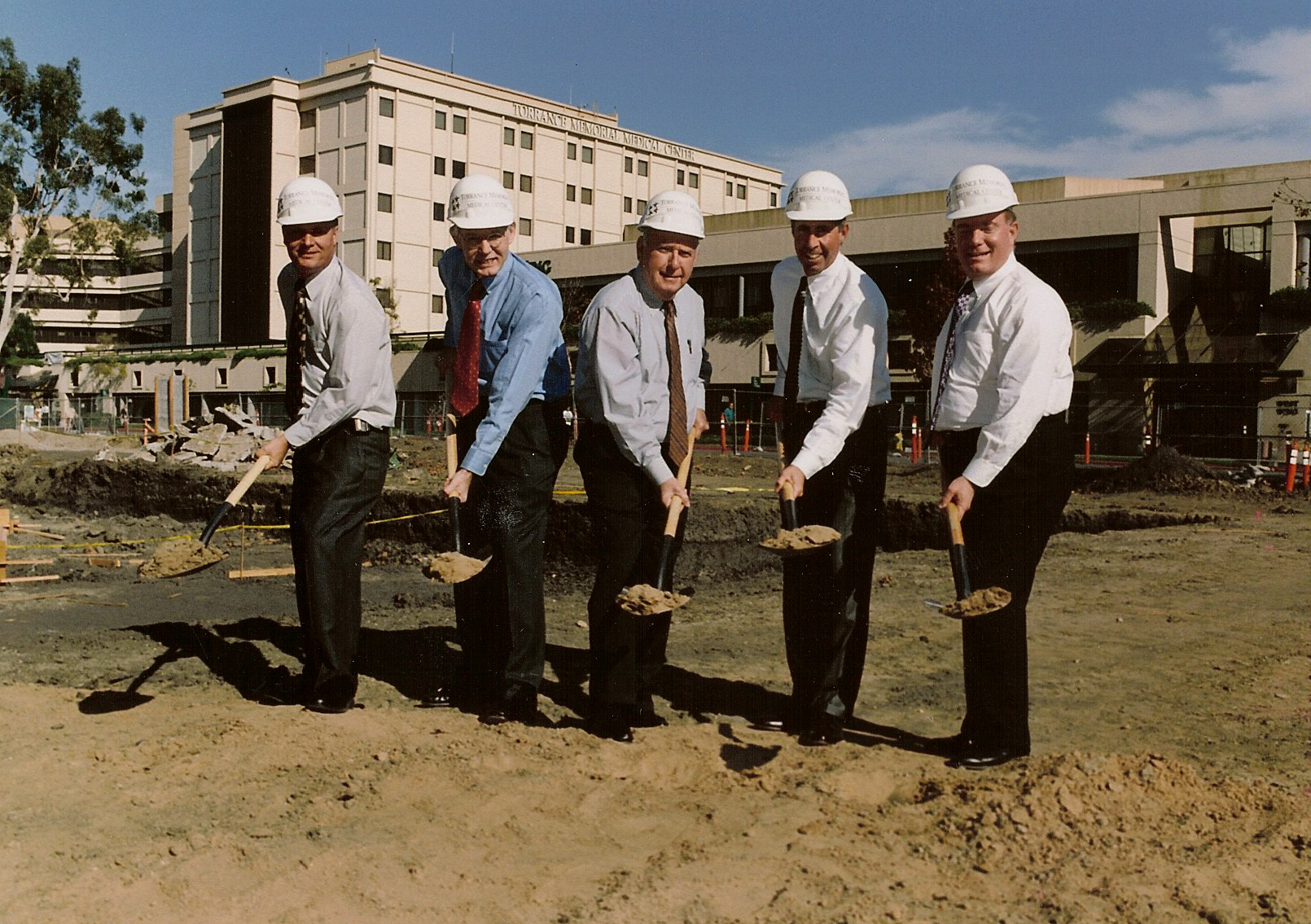 William Averill, MD, Thomas Simko, MD, George Graham, Craig Leach and William Collier digging in at the West Tower groundbreaking in 2003